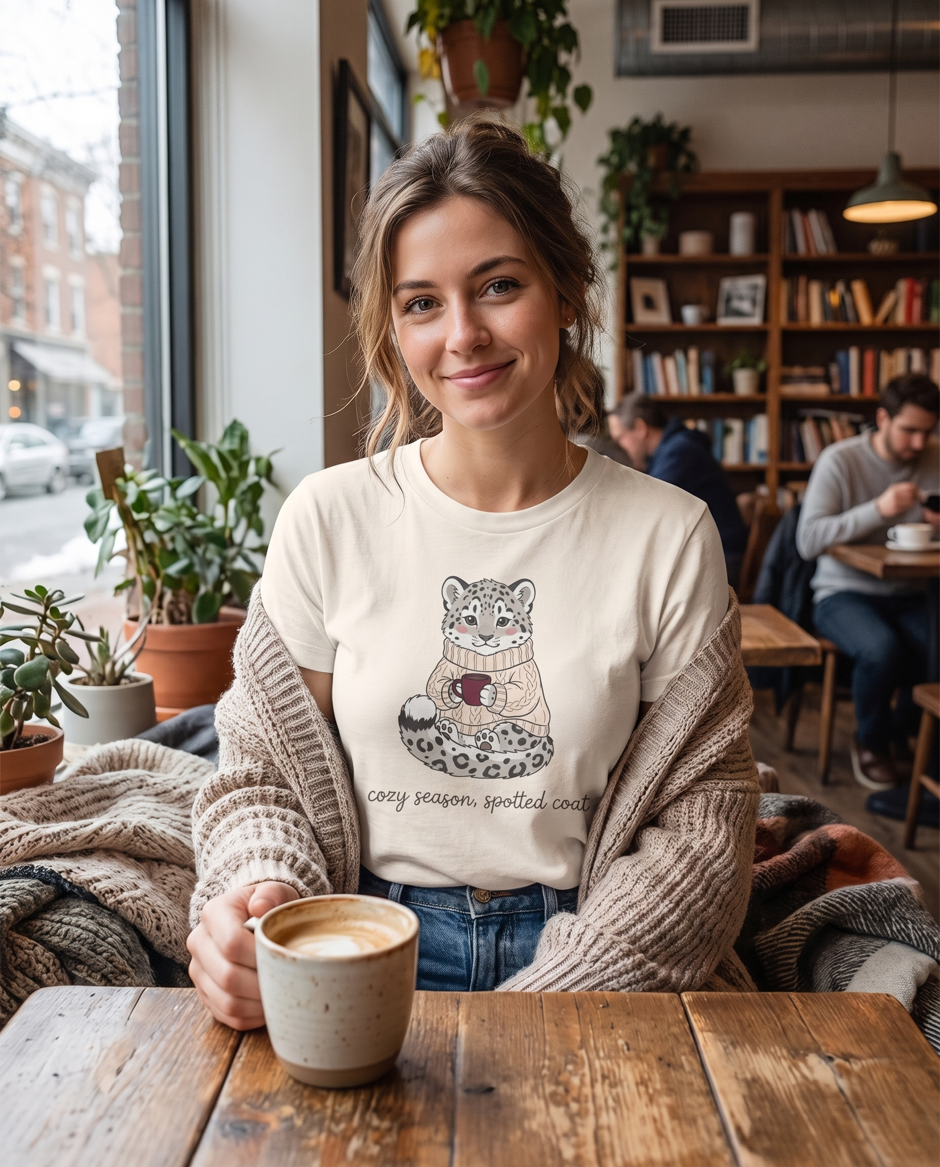 Snow Leopard Cozy Season Tee worn by a model