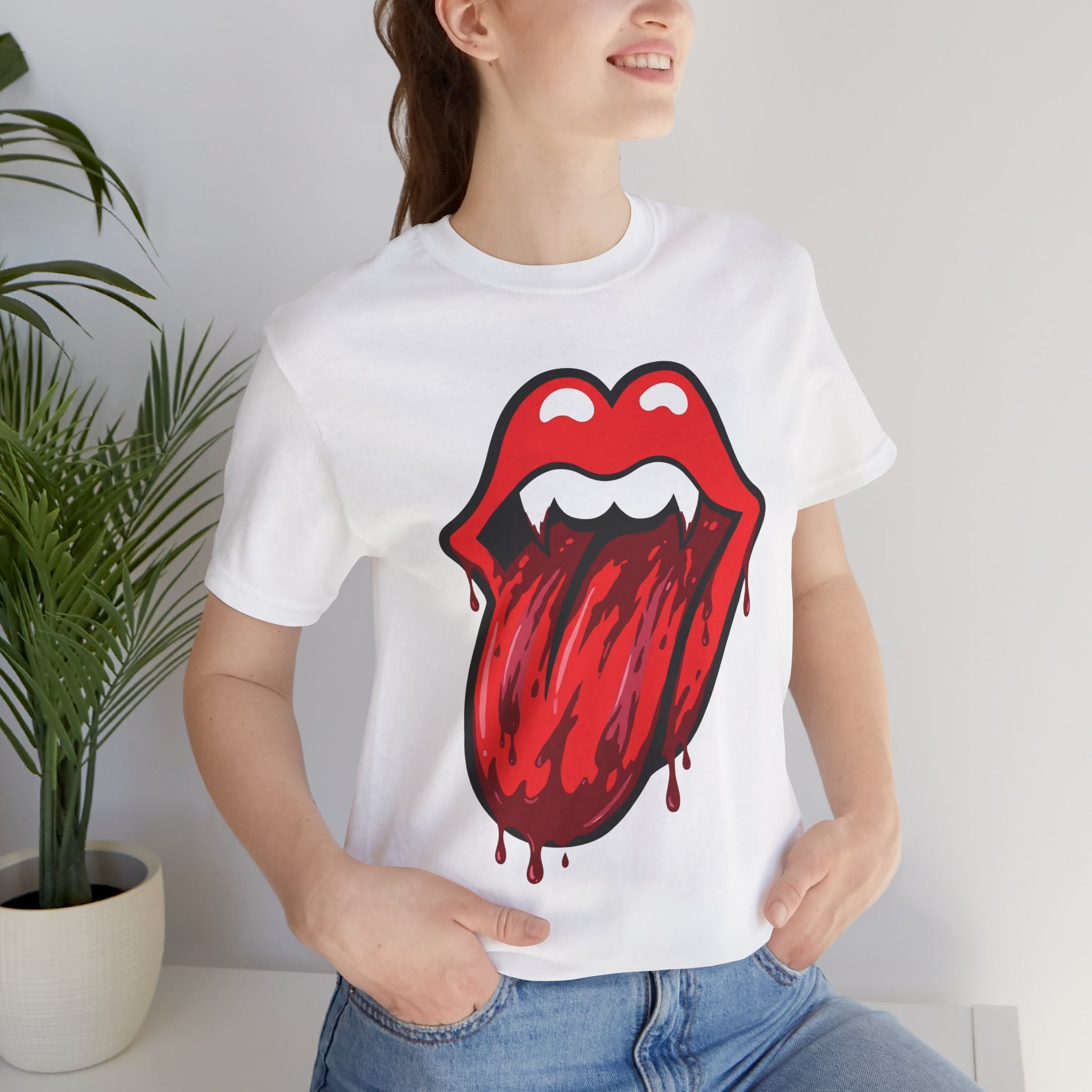 Retro Vampire Dripping Red Tongue Graphic Tee worn by a model